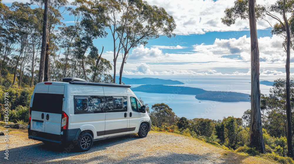 A campervan is parked at a scenic viewpoint, surrounded by trees and providing a breathtaking view of hills and water. Perfect location for relaxation and exploration. A campervan is parked at a scenic viewpoint, surrounded by trees and providing a breathtaking view of hills and water. Perfect location for relaxation and exploration.