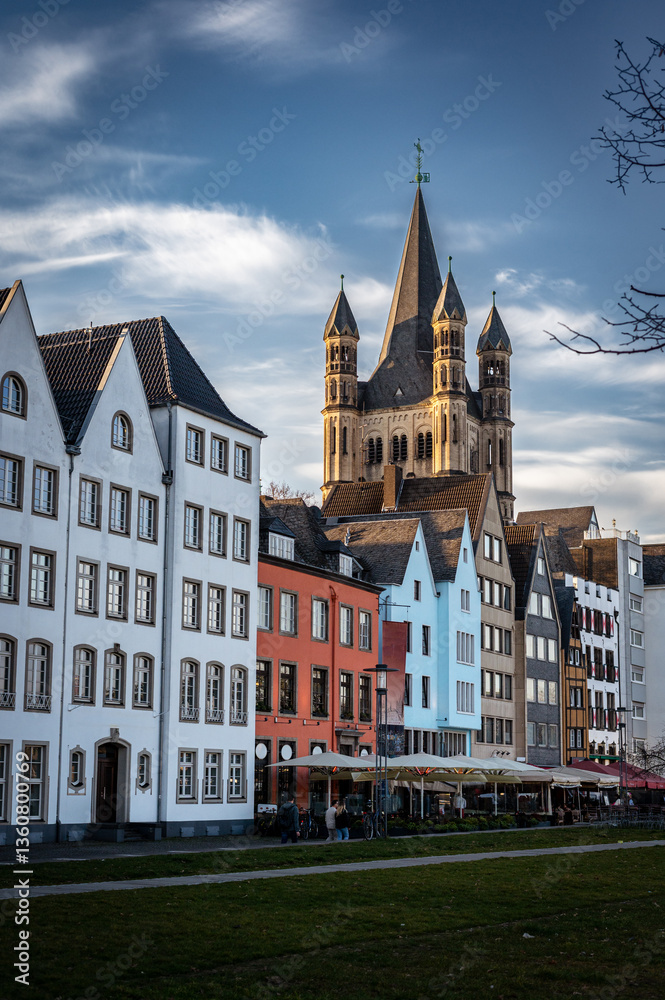 Fototapeta premium Cologne, Germany - March 7 2025: City skyline in spring along the Rhine river