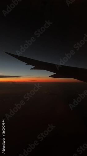Looking out from an airplane during suset