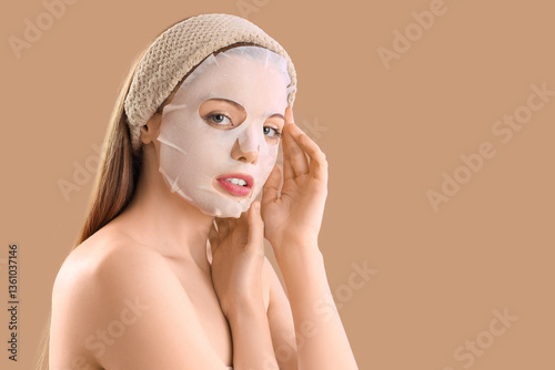 Young woman with facial she...