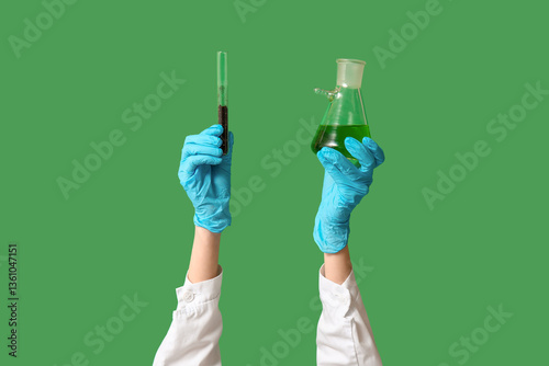 Scientist's hands holding t...