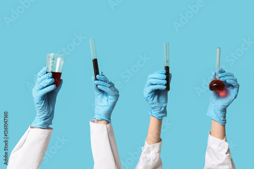 Scientist's hands holding t...