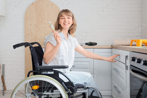 Young woman in wheelchair w...
