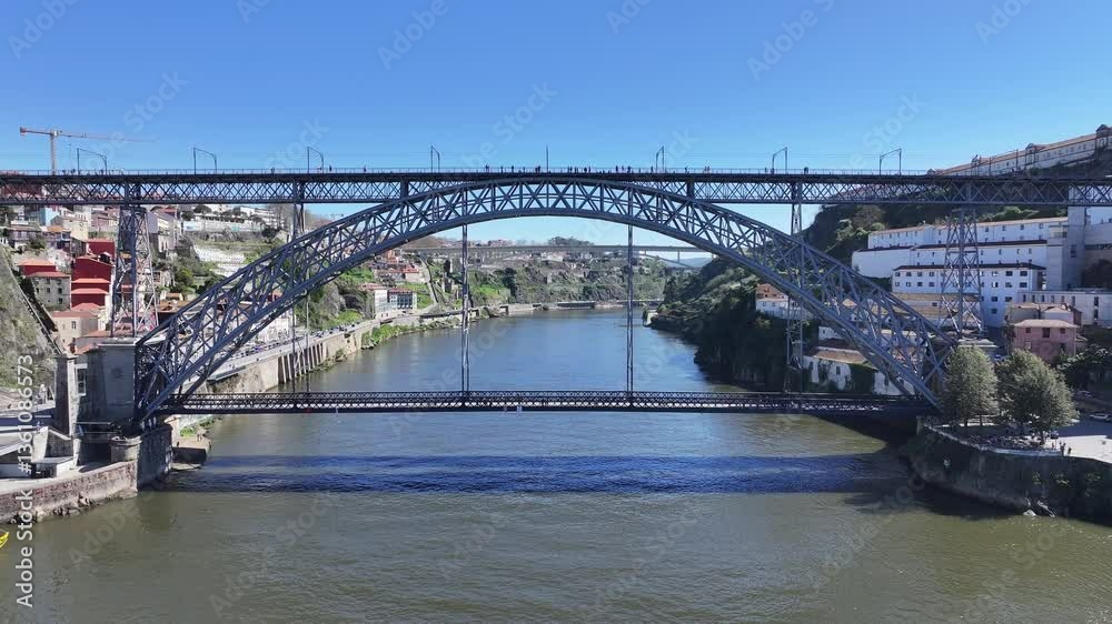 Luis I Bridge At Porto In Porto District Portugal. Downtown Cityscape. Railway Bridge. Railroad Scenery. Luis I Bridge At Porto In Portugal. Tourism Landmark. Luis I Bridge At Porto In Porto District Portugal. Downtown Cityscape. Railway Bridge. Railroad Scenery. Luis I Bridge At Porto In Portugal. Tourism Landmark.