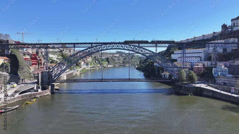 Luis I Bridge At Porto In Porto District Portugal. Downtown Cityscape. Railway Bridge. Railroad Scenery. Luis I Bridge At Porto In Portugal. Tourism Landmark. Luis I Bridge At Porto In Porto District Portugal. Downtown Cityscape. Railway Bridge. Railroad Scenery. Luis I Bridge At Porto In Portugal. Tourism Landmark.