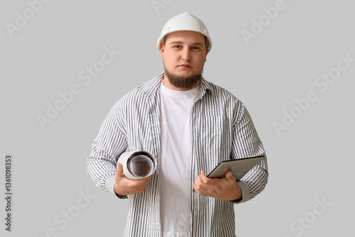 Young male engineer with ta...
