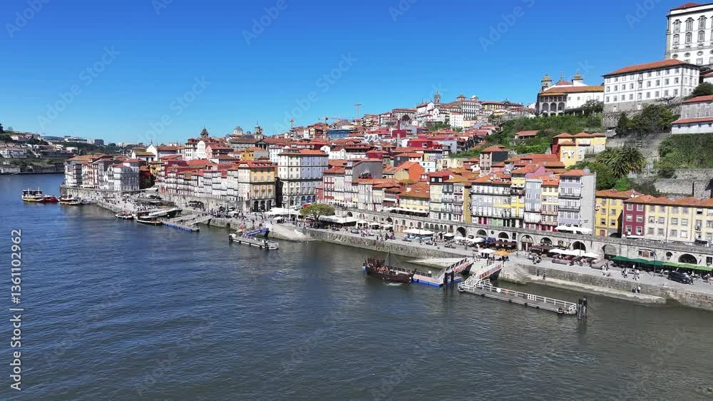 Ribeira Pier At Porto In District Of Porto Portugal. Downtown District. Medieval Buildings. Historical City Scene. Ribeira Pier At District Of Porto In Portugal. Tourism Landmarks. Ribeira Pier At Porto In District Of Porto Portugal. Downtown District. Medieval Buildings. Historical City Scene. Ribeira Pier At District Of Porto In Portugal. Tourism Landmarks.