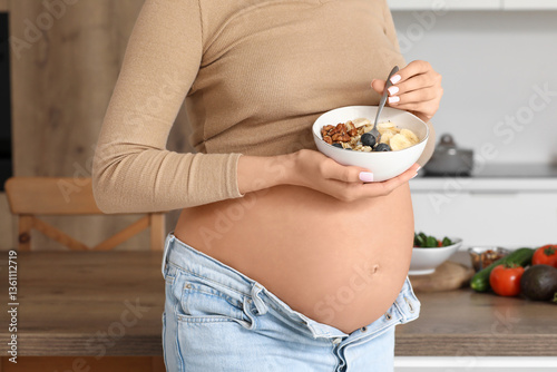 Young pregnant woman with t...