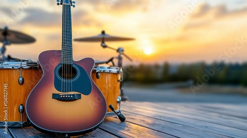 Acoustic Guitar and Drum Set at Sunset in Outdoor Music Setting