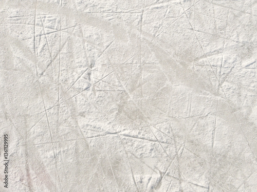 Ice background with marks from skating and hockey. Ice hockey rink scratches surface