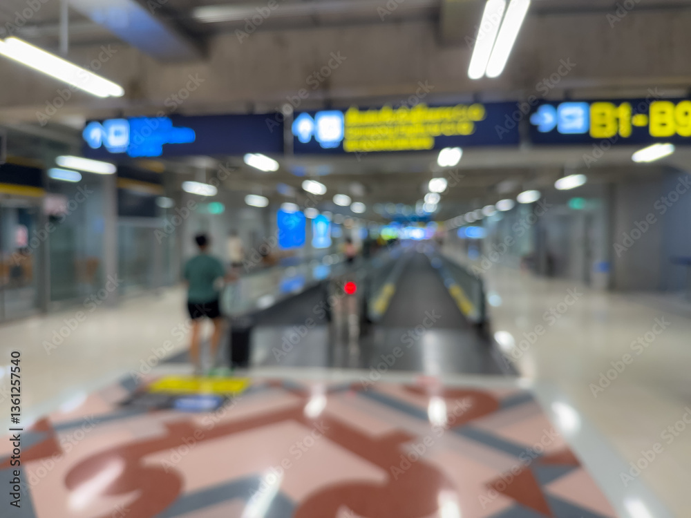 Blurred Airport Walkway with Travelers Blurred Airport Walkway with Travelers