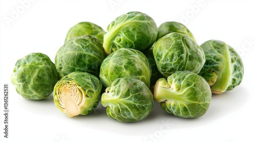 A bunch of green broccoli with some of them cut off