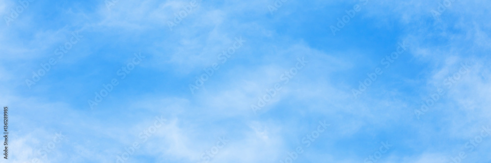 Fantastic soft white clouds against blue sky and copy space horizontal shape. Web banner.Website header.