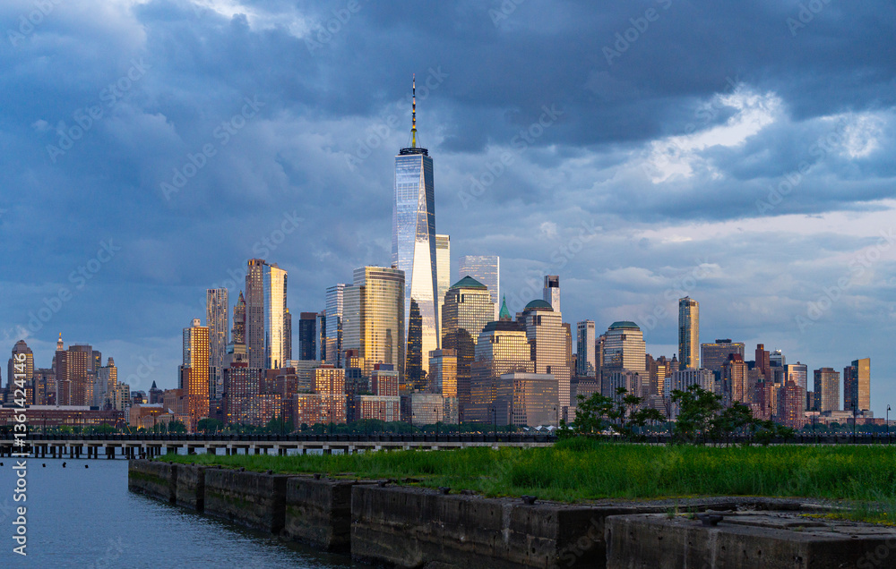 Obraz premium New York City. NYC cityscape with skyscrapers. Panoramic view of New York City skyline. Manhattan skyline. New York and Hudson River. Downtown NYC. New York skyscrapers. The business district of NYC.