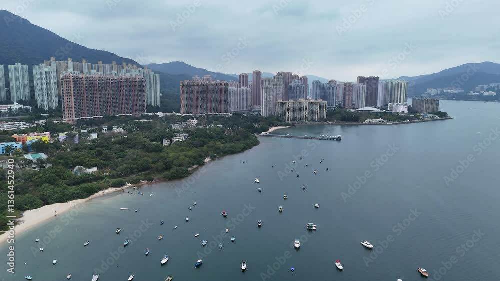 Aerial view of the large scale seaside housing development in Ma On Shan with access to beaches, parks and recreation facilities.