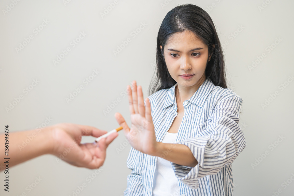 Quit smoking, stop smoke, addiction asian young woman, girl refusing cigarette, smoker quitting smoke, hand in refuse, deny tobacco. Quit bad habit, health care concept. Willpower lifestyle of people. Quit smoking, stop smoke, addiction asian young woman, girl refusing cigarette, smoker quitting smoke, hand in refuse, deny tobacco. Quit bad habit, health care concept. Willpower lifestyle of people.
