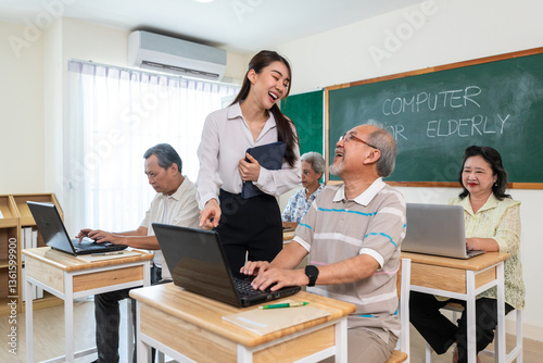 Asian female instructor teaching mature students in classroom at school.