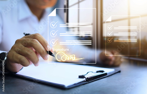 Businessman in white shirt sitting at desk is signing electronically or e sign to approve project or grant financial power of attorney to company representative.