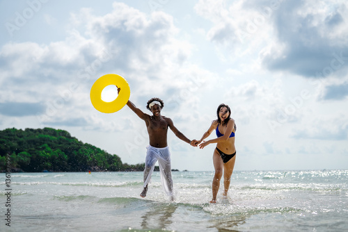 A diverse couple explores the world with peace of mind, thanks to the right travel insurance