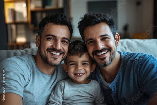 male gay couplle family with a child smiling in the living room having a good time the three together sitting on the couch sofa, kid with two fathers, fathers day LGBT, generative AI