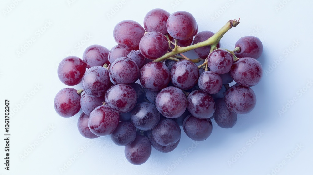 Fototapeta premium Fresh red grapes bunch on light blue background
