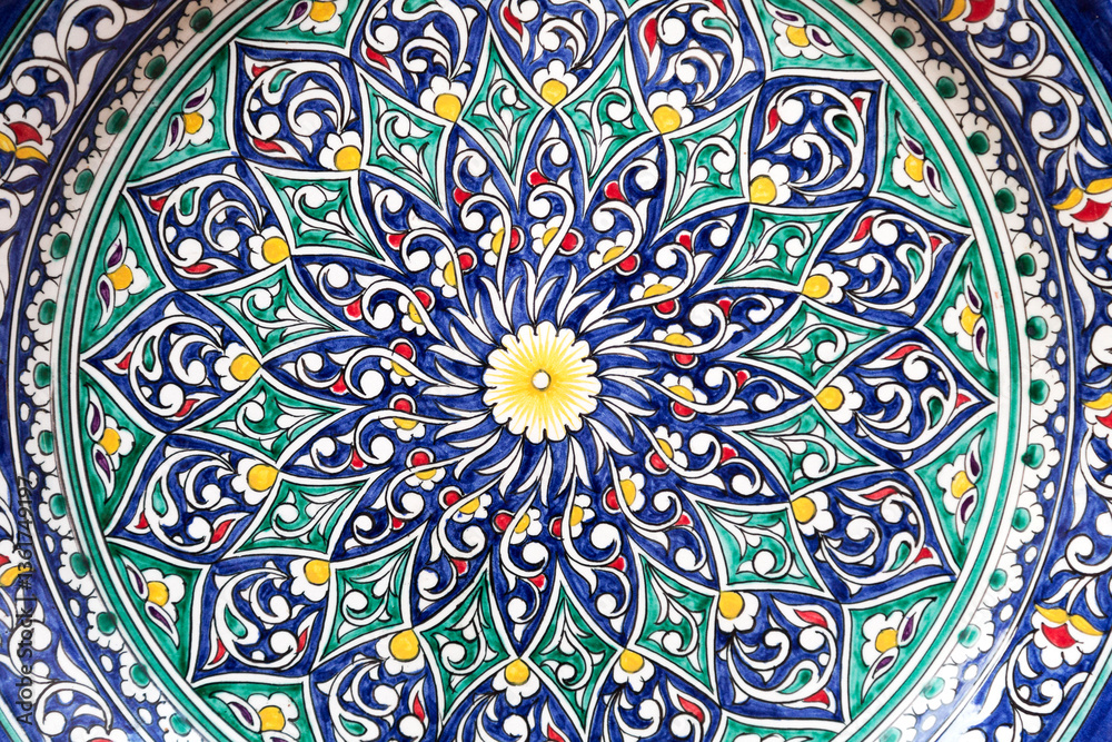 Fragment of painting Uzbek dishes for pilaf with national patterns