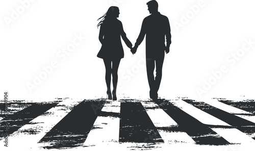 Silhouette of a couple holding hands while walking on a crosswalk for romantic themes.