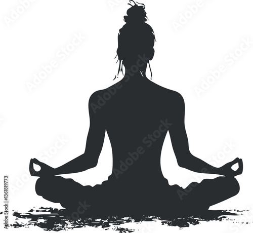 Silhouette of a woman in lotus pose for meditation and relaxation themes.