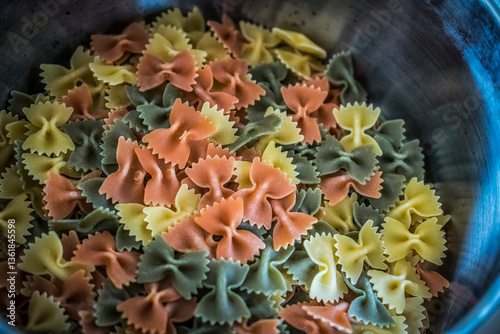 A bunch of colorful pasta bows in a pot