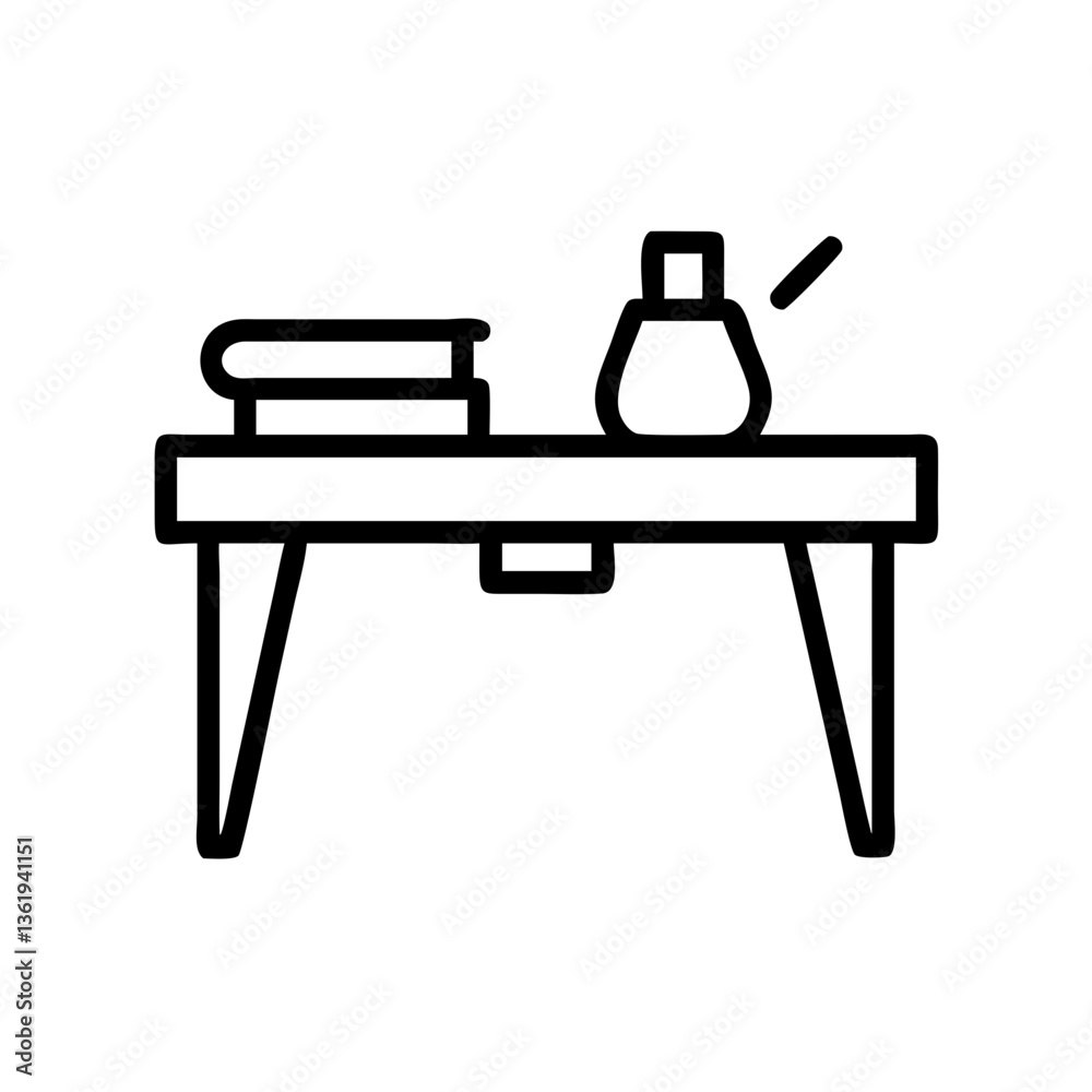 Minimalist workshop table with books and a glass container Minimalist workshop table with books and a glass container