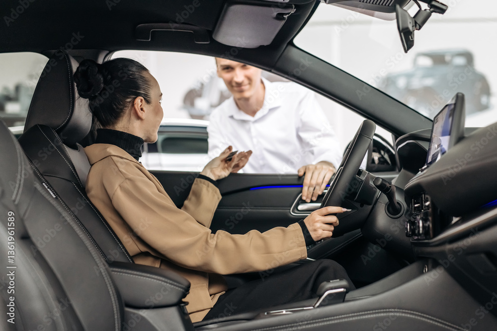The completion of a car purchase or rental deal, with the handover of keys. Concept the final step of a seamless car buying, selling, or test-driving experience, highlighting customer satisfaction. The completion of a car purchase or rental deal, with the handover of keys. Concept the final step of a seamless car buying, selling, or test-driving experience, highlighting customer satisfaction.