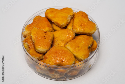 Golden Heart-Shaped Kue Kacang Cookies: A Sweet Indonesian Tradition