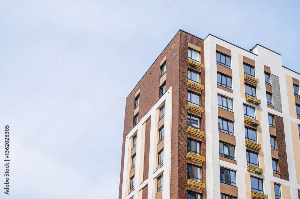 Multi-storey apartment building. New residential complex in the city Multi-storey apartment building. New residential complex in the city