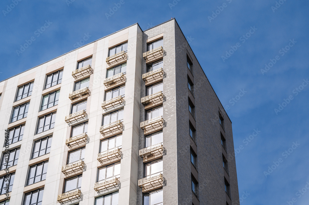 Multi-storey apartment building. New residential complex in the city Multi-storey apartment building. New residential complex in the city