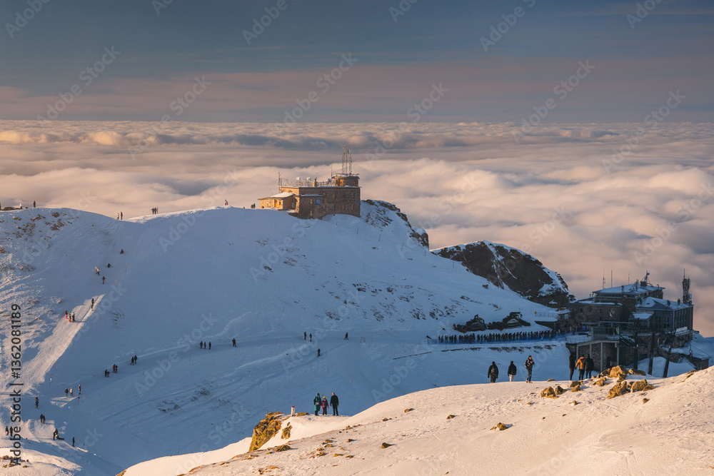 Snow-covered peaks of the Tatra Mountains with Kasprowy Wierch in winter. Stunning alpine scenery, perfect for skiing, hiking, and photography. Cold, crisp air and breathtaking views