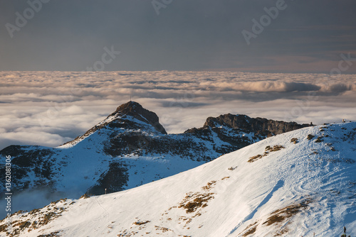 Obraz na płótnie Snow-covered peaks of the Tatra Mountains with Kasprowy Wierch in winter. Stunning alpine scenery, perfect for skiing, hiking, and photography. Cold, crisp air and breathtaking views w salonie