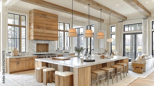 Modern farmhouse kitchen with large island, wood beams, and expansive windows.