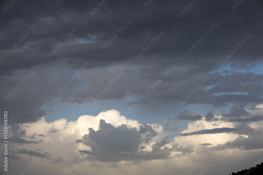 Dark Storm Clouds with Light Breaking Through Dark Storm Clouds with Light Breaking Through