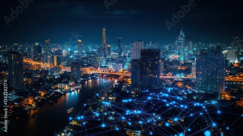 Night city skyline connected by digital network. Aerial view. Stock photo
