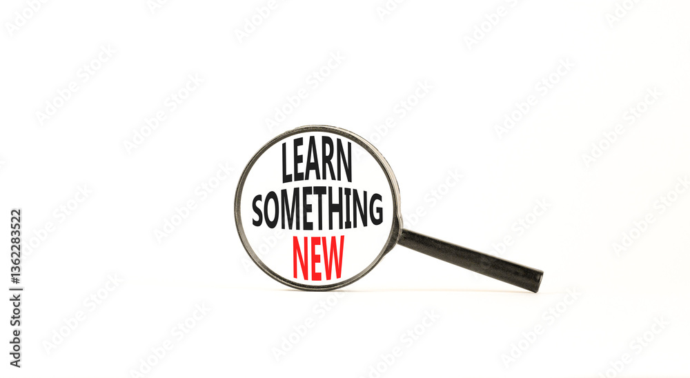 Learn something new symbol. Concept words Learn something new in beautiful magnifying glass. Beautiful white background. Business motivational lifestyle learn something new concept. Copy space. Learn something new symbol. Concept words Learn something new in beautiful magnifying glass. Beautiful white background. Business motivational lifestyle learn something new concept. Copy space.
