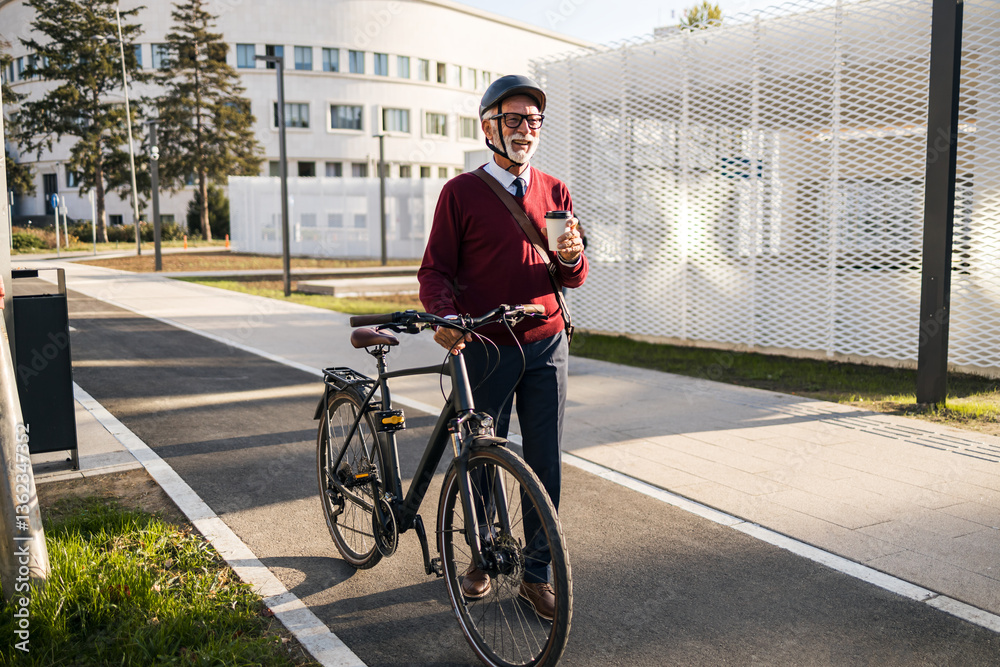 Senior Businessman Enjoying Coffee While Walking with Bicycle Near Modern Office Building Senior Businessman Enjoying Coffee While Walking with Bicycle Near Modern Office Building