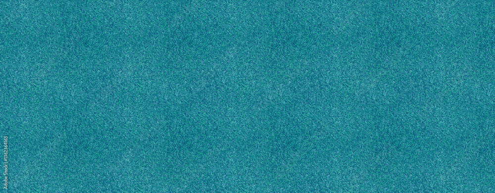 Obraz premium A bright turquoise background features a soft texture, perfect for creative uses in graphic design, web design, or artistic projects. The vibrant color adds energy