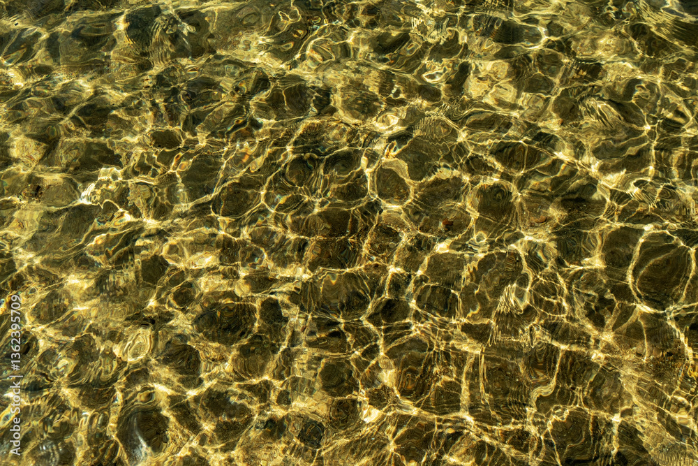 Clear lake water, patterns on the surface and reflections at Lake Tahoe. Clear lake water, patterns on the surface and reflections at Lake Tahoe.