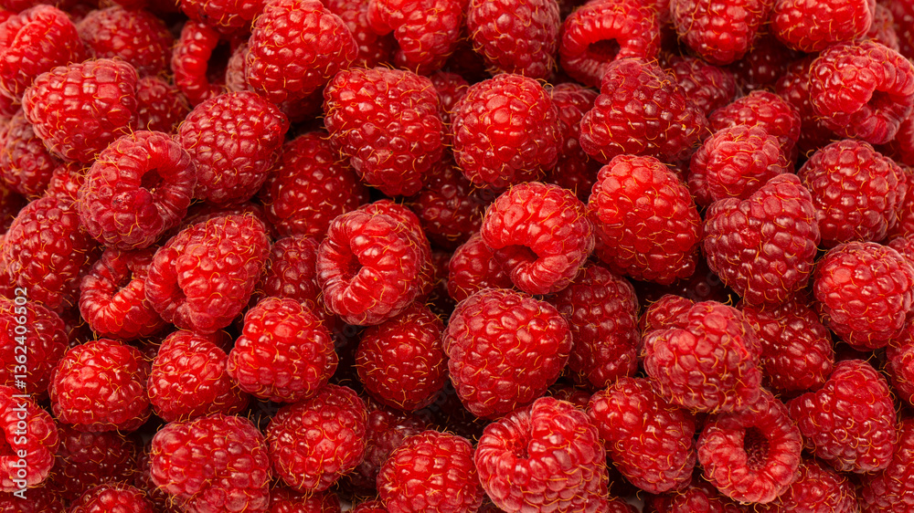 Tasty fresh raspberry as a background. Tasty fresh raspberry as a background.