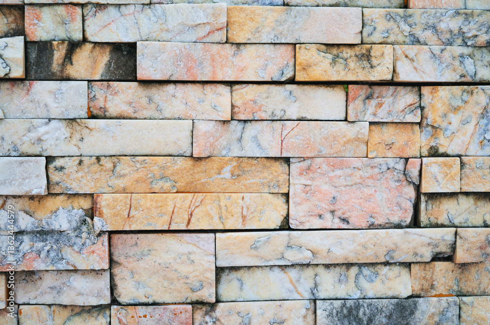 brick background, Abstract geometric pattern texture, Classic outdoor building granite blocks wall. brick background, Abstract geometric pattern texture, Classic outdoor building granite blocks wall.