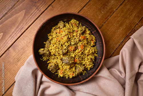 Obraz na płótnie Spiced Rice with Meat and Vegetables in Bowl w salonie