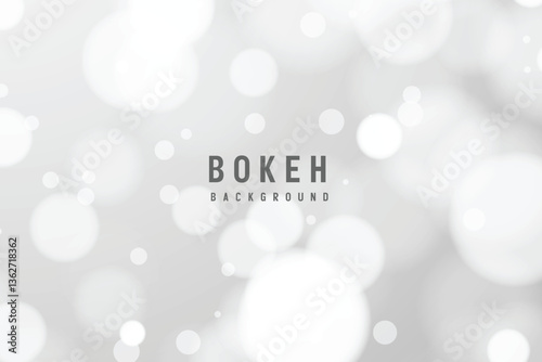 Delicate, light gray bokeh background with soft, circular highlights