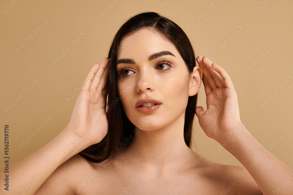 Glowing beauty exudes confidence in studio setting with flawless skin Glowing beauty exudes confidence in studio setting with flawless skin