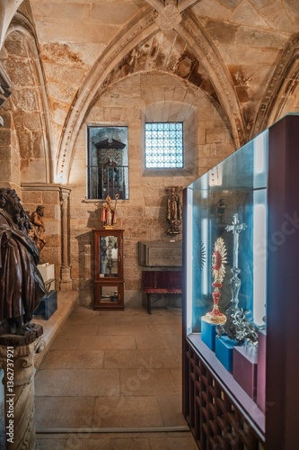 Display case exhibiting religious artifacts in orense cathedral, spain