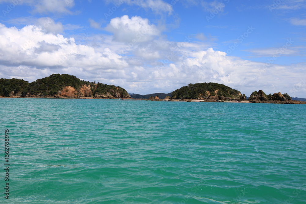 The Bay of Islands is an area on the east coast of the Far North District of the North Island of New Zealand The Bay of Islands is an area on the east coast of the Far North District of the North Island of New Zealand